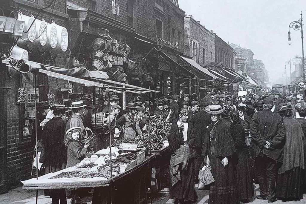 Chrisp Street Market when it was a busy street market in 1904. packed out street of East End Edwardians