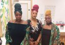 Three models wearing colourful Lyn Gerald designs at the Justice in Fashion show.
