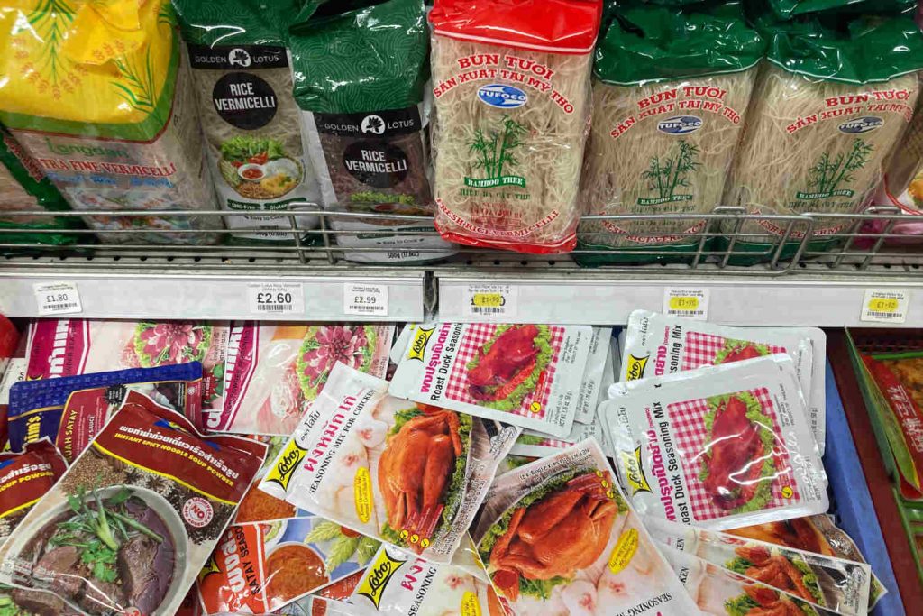 Noodles and seasoning packets inside Alan's Supermarket.