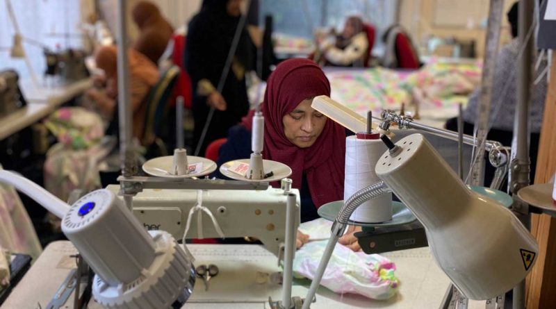 Women sewing at Stitches in Time, Limehouse Town Hall, Tower Hamlets.